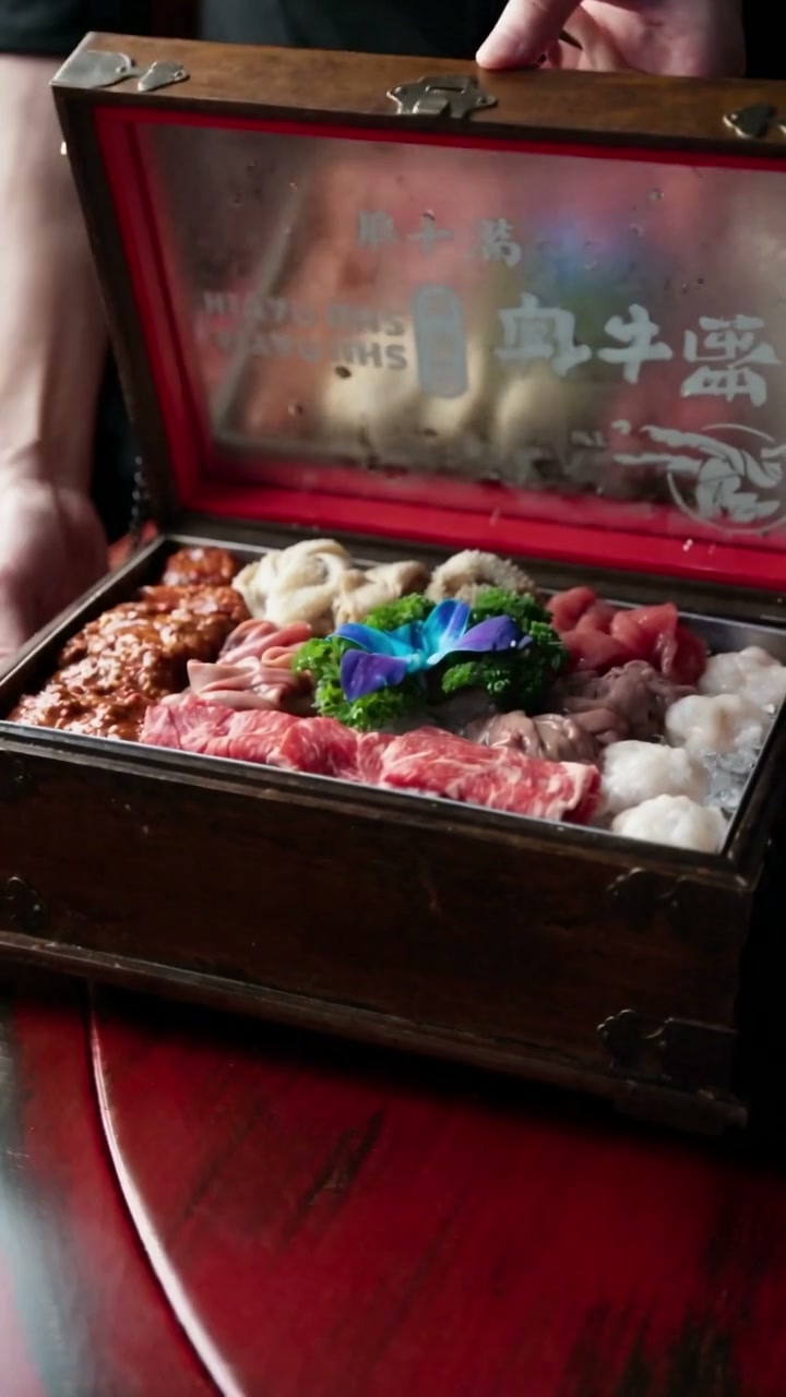 A presentation chest filled with hot-pot ingredients