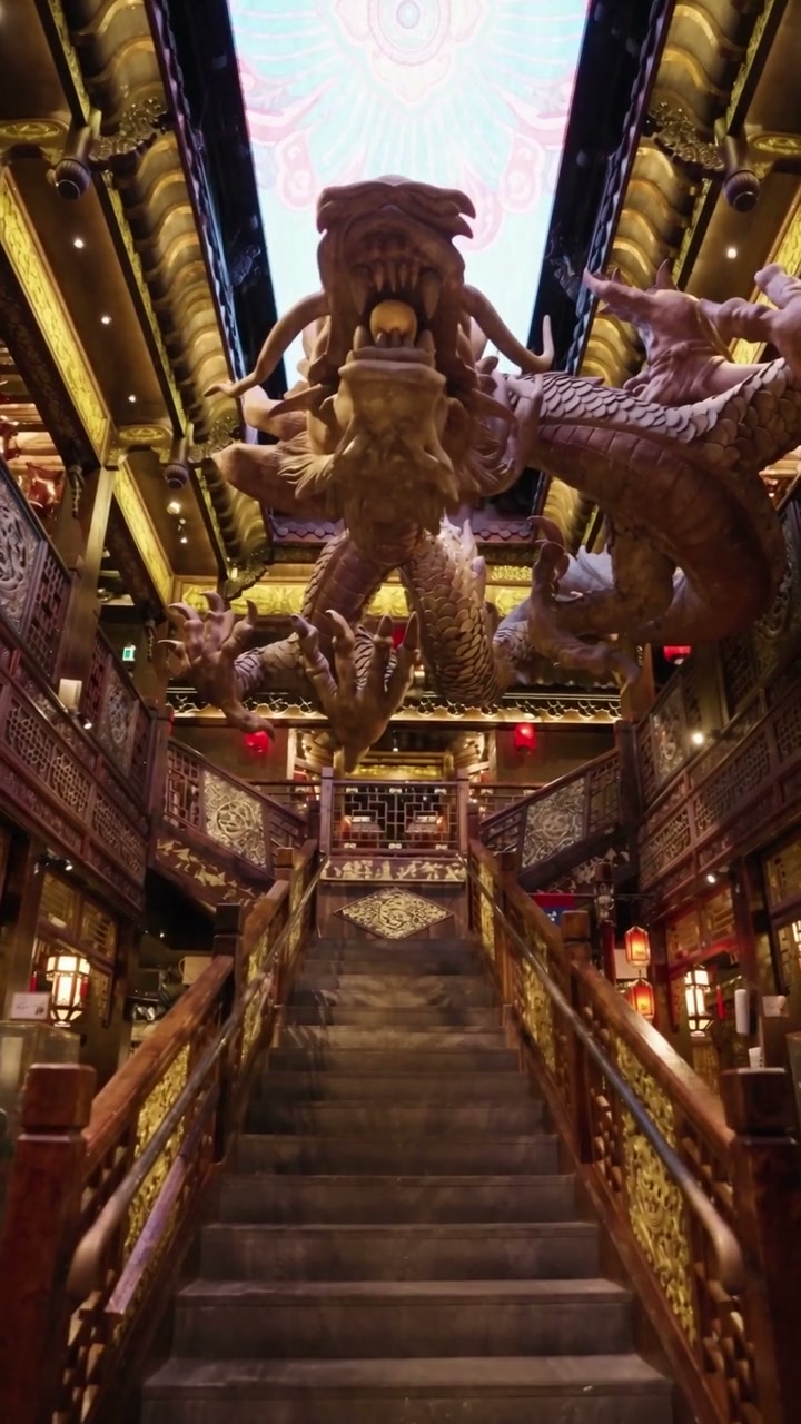 Panda Hot Pot dragon installation above the central staircase